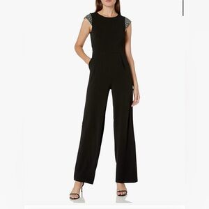 Black Calvin Klein Calvin Klein womens Cap Sleeve Jumpsuit With Pockets
